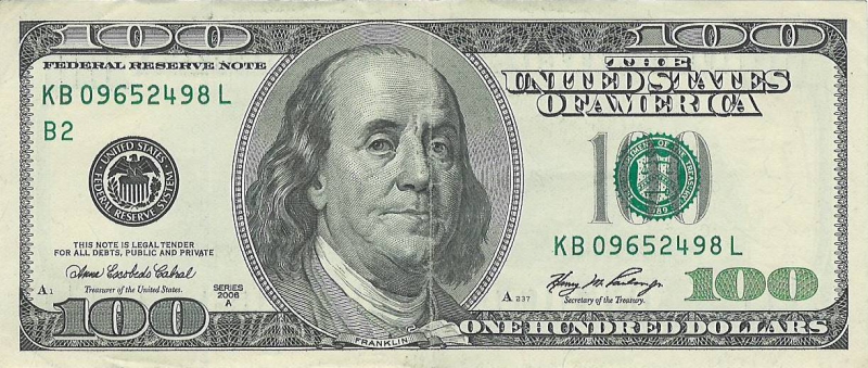 Доллар. Фото: REX